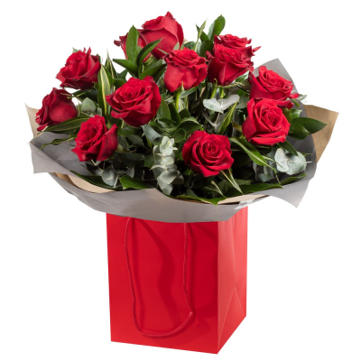 Simply Red - A classic bouquet of luxurious red roses complemented by fresh eucalyptus and lush greenery.