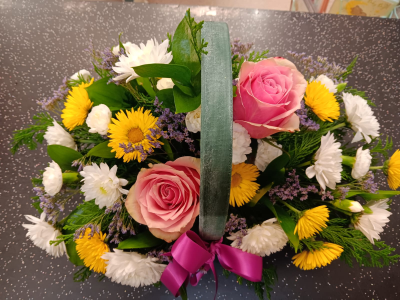 Country Charm Basket - A charming basket arrangement of soft pink, white and sunny yellow blooms, beautifully handcrafted by City Florists in Inverness.