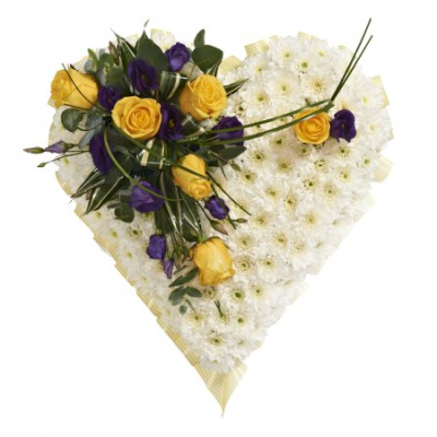 Treasured Heart - A beautiful heart-shaped funeral tribute, thoughtfully arranged to create a meaningful and elegant expression of love and remembrance. Finished with a delicate feature detail, this heartfelt design is a fitting way to honour someone special and say a final farewell.