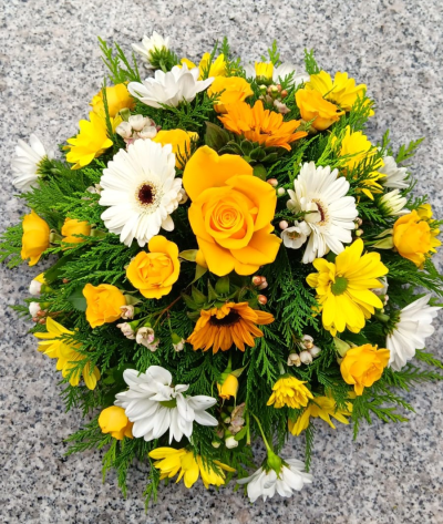 Golden Posy - A bright and uplifting funeral posy, thoughtfully arranged in cheerful yellow, white and warm golden tones.